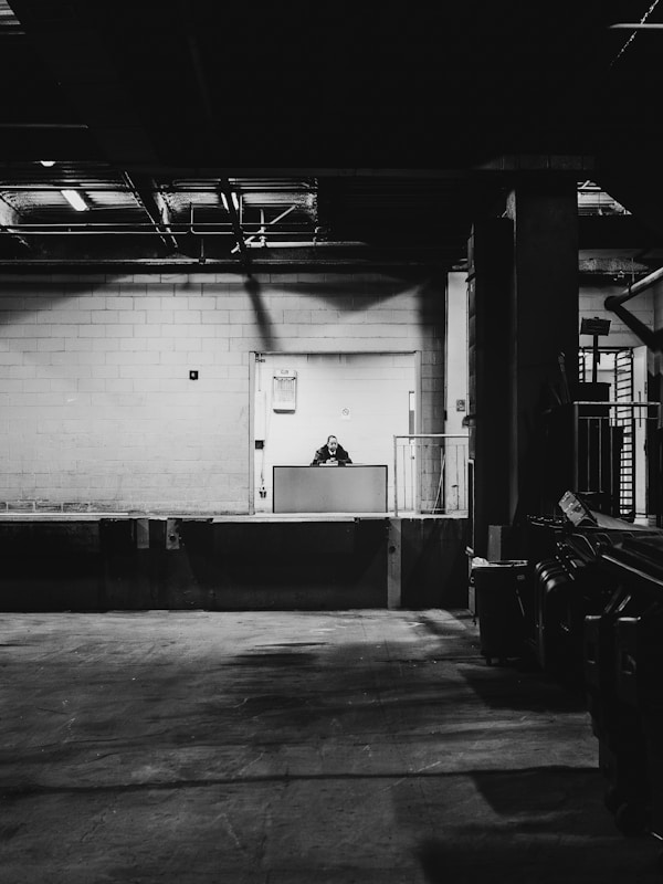 Warehouse interior with shelving and lighting